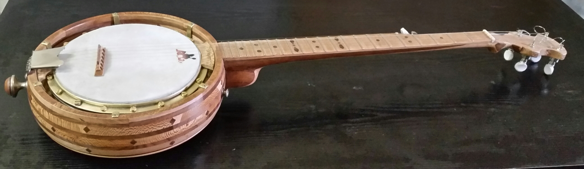 Cast-metal banjo parts made for Haystack Banjos
